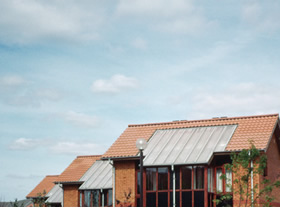 Photo of a building with solar panels on the roof