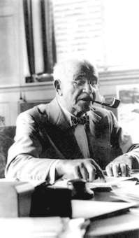 Samuel McLaughlin, shown at his desk in 1954