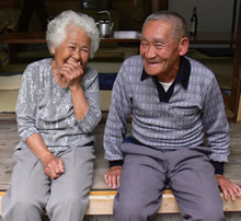 Photo of an elderly couple smiling