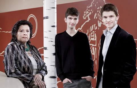 Aboriginal studies professor Cynthia Wesley-Esquimaux with Canadian Roots Exchange founders, David Berkal and Ronan MacParland.