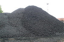 Photo of a pile of petroleum coke.