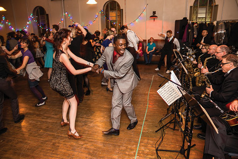 Photo of people swing dancing.