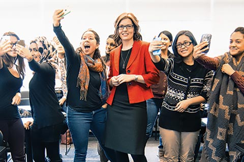 Photo of Maggie Cummings with her students.