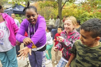 Children marvel at the monarchs at the opening of UTSC’s Fred Urquhart Memorial Garden Photo: Ken Jones.