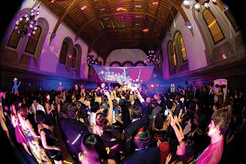 Photo of people dancing in UC Fireball with a fishbowl effect