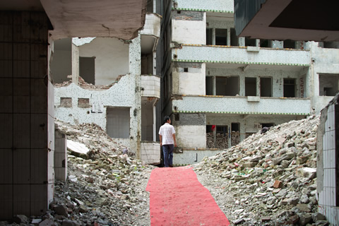 A man surveys the rubble in Guangzhou, China