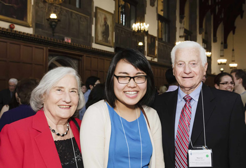 Paigs Zhang (centre) with donors Roslyn and Murray Herst.