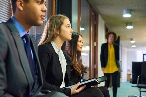 Photo of job candidates waiting for their interviews