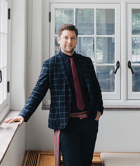 Musician Conlin Delbaere-Sawchuk, wearing the colourful woven sash that’s a hallmark of Métis culture, thinks disputes over cultural appropriation could one day end up in court. Photo: Ian Patterson.