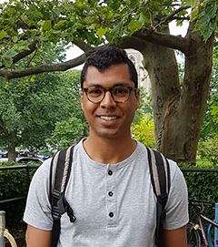 Headshot of Derek Fong outside of Gerstein Library.