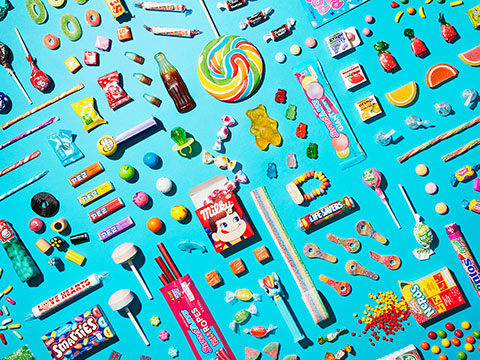 Photo of lost of different kinds of candy, representing a profusion of consumer choice.