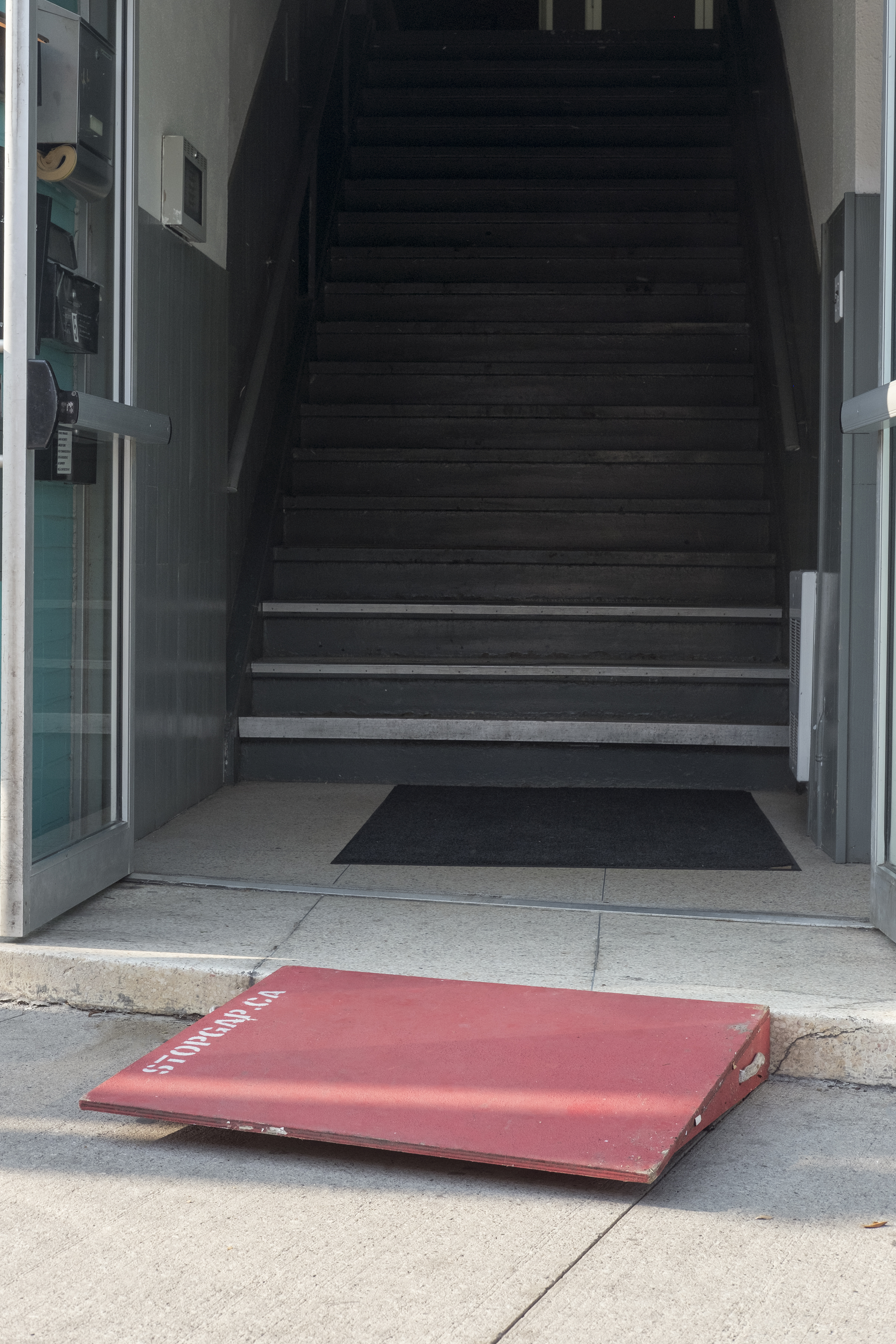 A stop gap ramp leading to a staircase