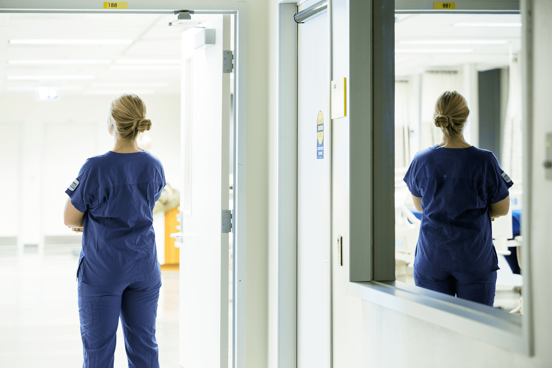 Nursing student Emma Taylor standing with back to camera at the Bloomberg Faculty of Nursing