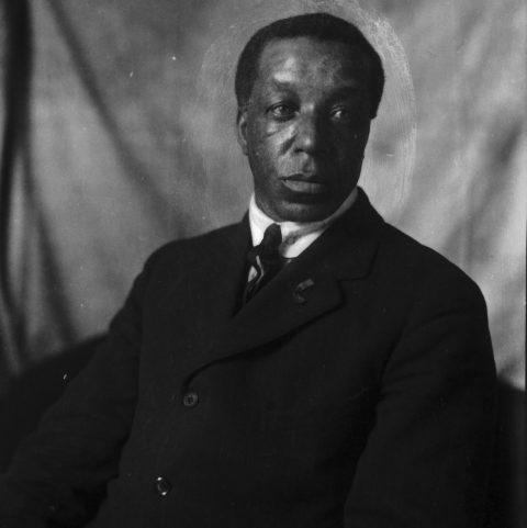 A black and white portrait of William (Billy) Beal, a Black settler who arrived in Swan Lake, Manitoba in 1906.