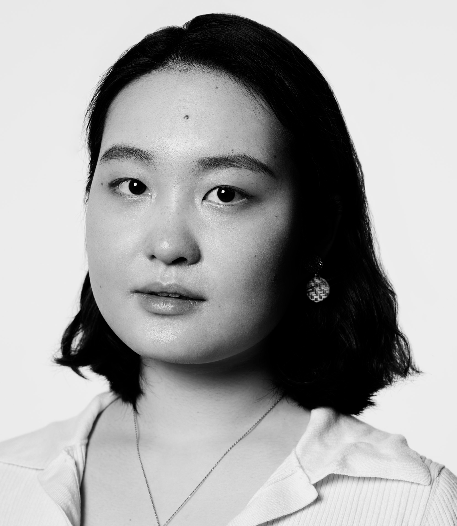 Black and white headshot of Chen Yang