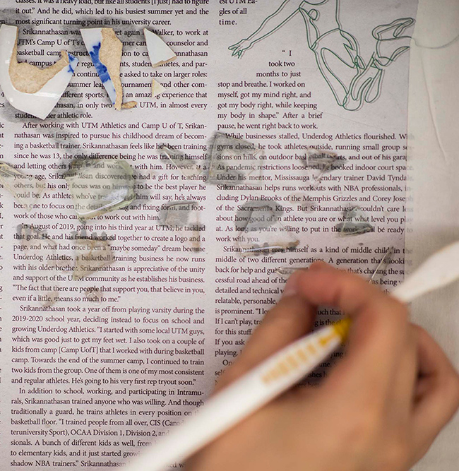 Glass and pottery shards placed on the pages of a book